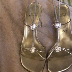 Gold tone Stuart Weitzman dress shoes